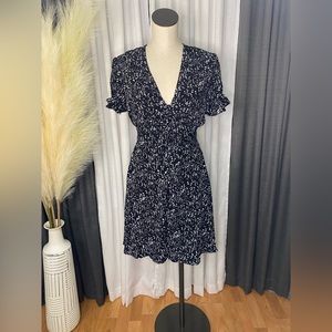 Black dotted button up dress